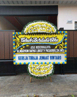 Papan Bunga Duka di Palapa